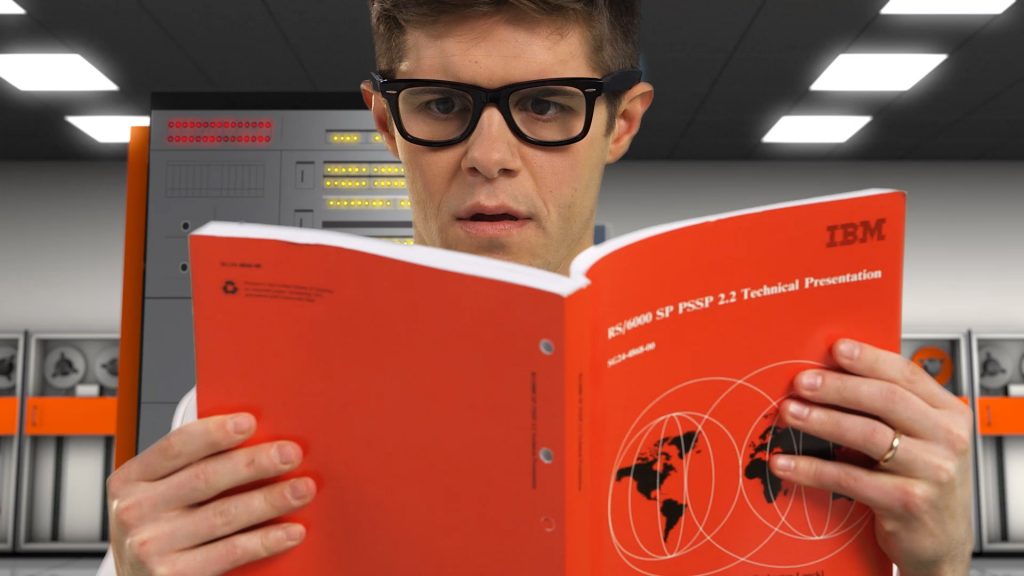 Visual effects composite of a man reading a Redbook in an IBM System 360 datacenter.
